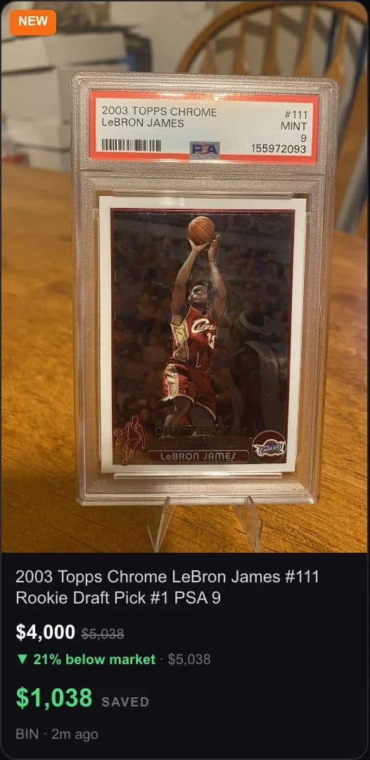 A single catch in the CardboardSniper feed: the 2003 Topps Chrome LeBron James #111 PSA 9 listed at $4,000 with the $5,038 comp struck through, 21 percent below market, $1,038 saved, Buy It Now, two minutes ago